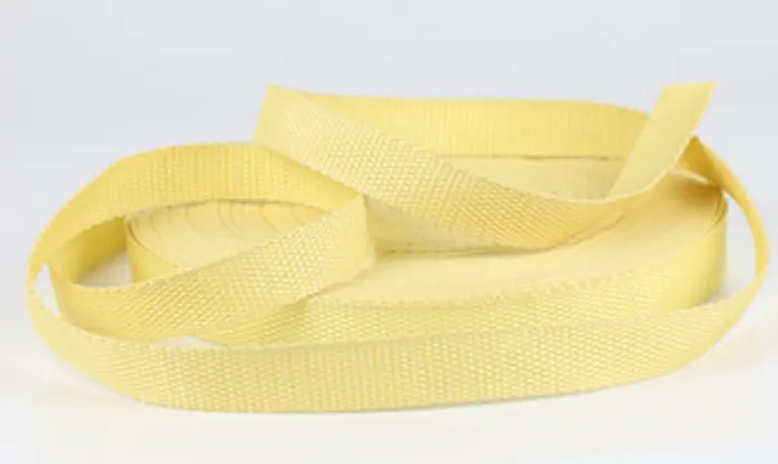 Rolls of yellow KEVLAR aramid webbing, known for its flame retardant and bulletproof properties.
